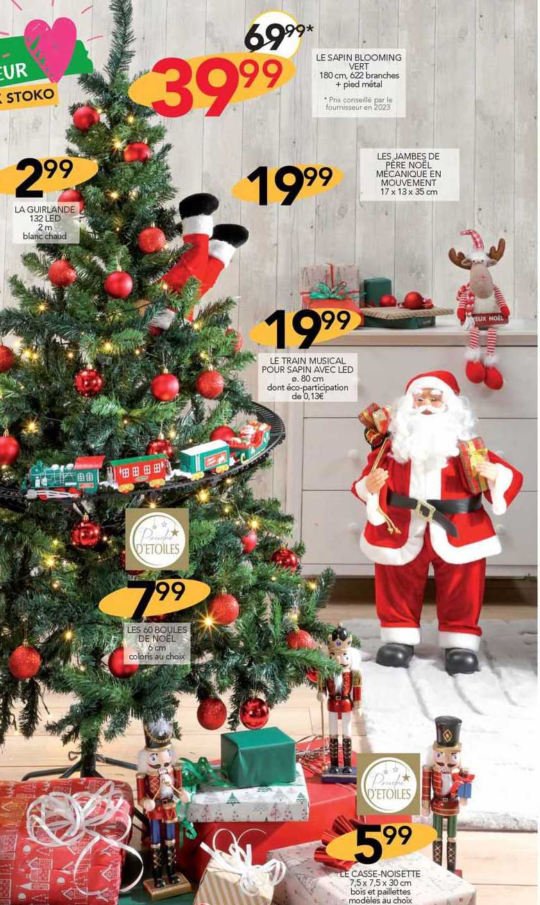 la guirlande 132 led, le sapin blooming vert, les jambes de père noël mécanique en mouvement, le train musical pour sapin avec led, les 60 boules de noël, le casse-noisette