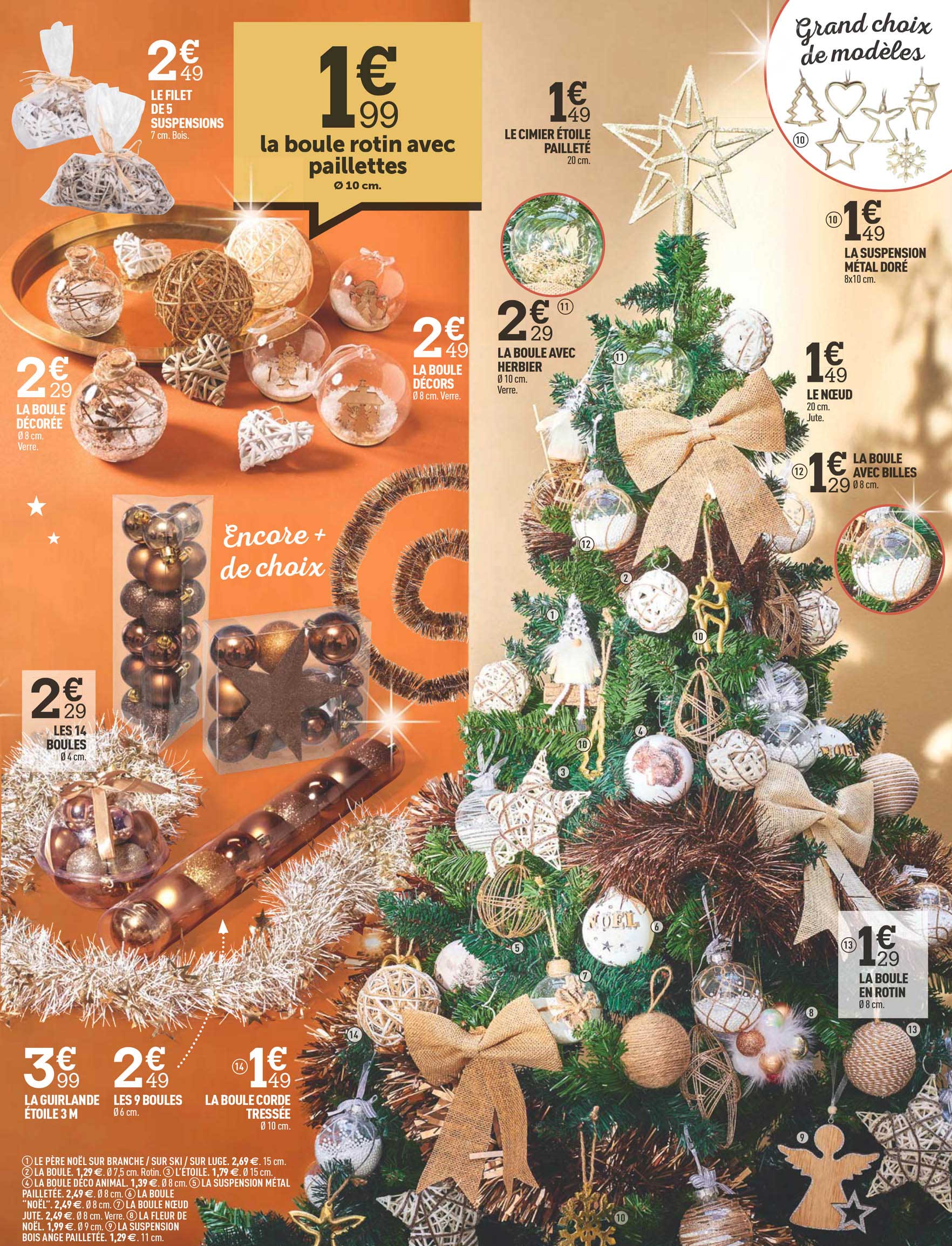 la boule rotin avec paillettes, le filet des suspensions, la boule décorée, le cimier étoile pailleté, la boule avec herbier, la suspension métal doré, le nœud, la boule avec billes, la boule en rotin