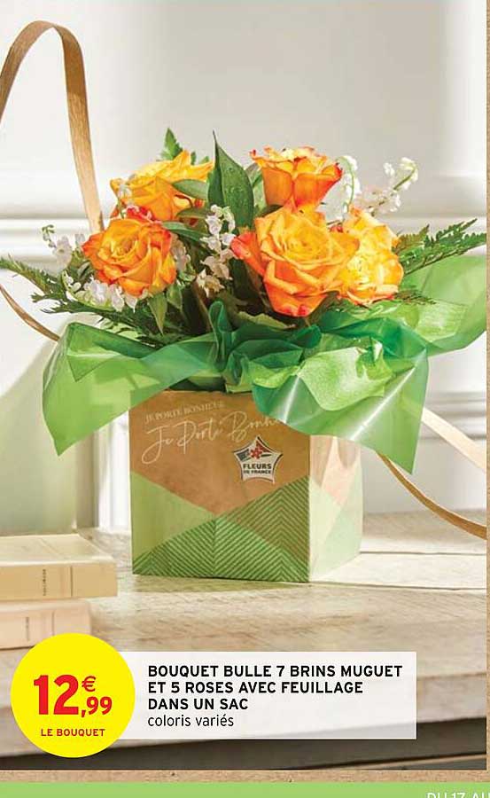 bouquet bulle 7 brins muguet et 5 roses avec feuillage dans un sac