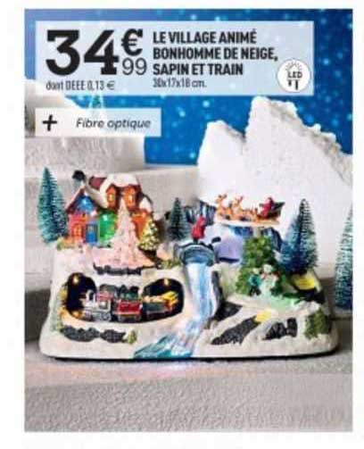 le village animé bonhomme de neige, sapin et train