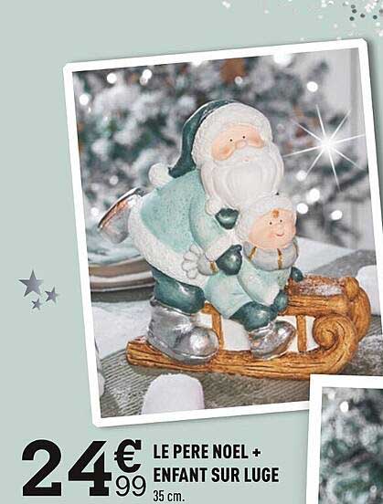 le père noël enfant sur luge