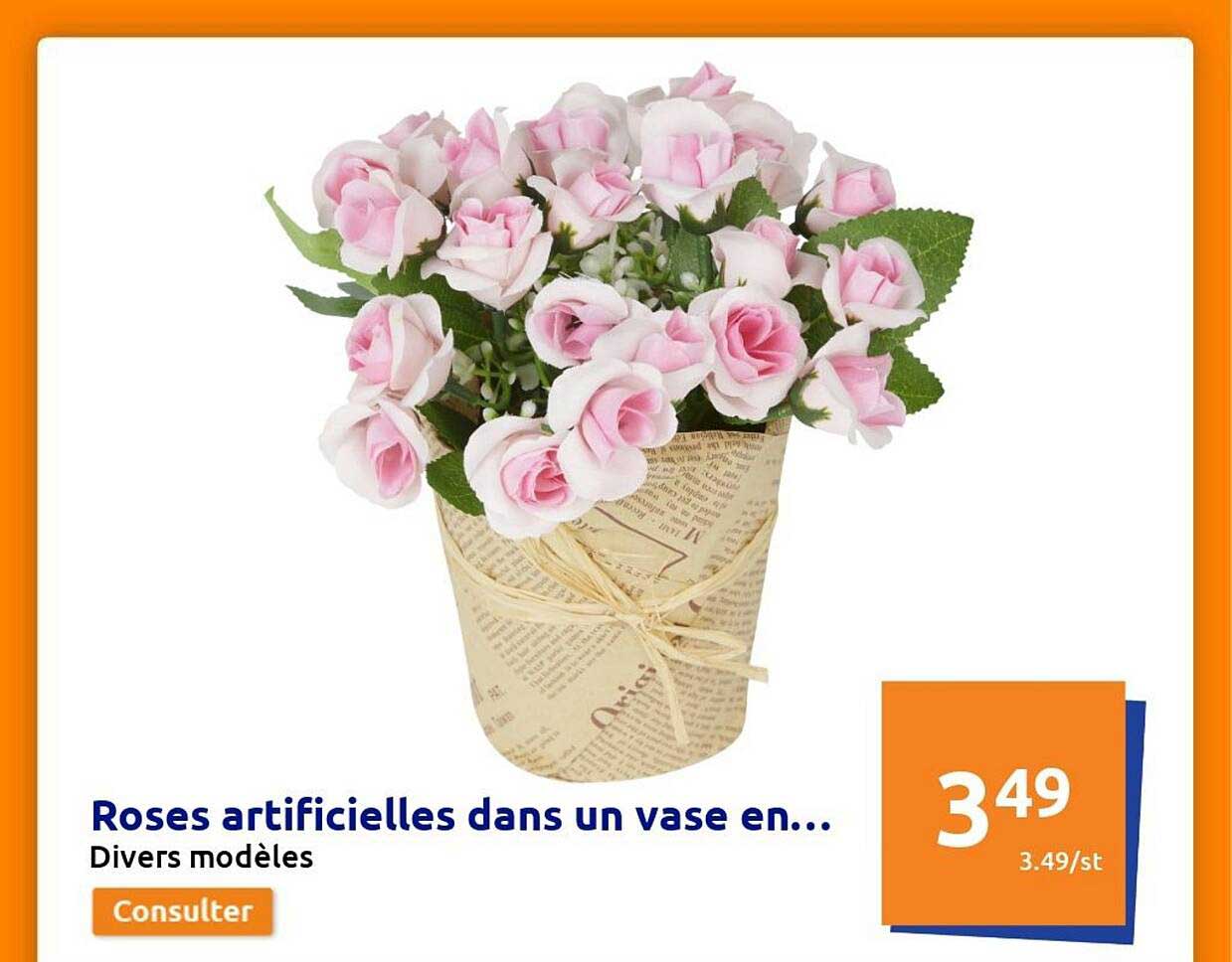 roses artificielles dans un vase en....