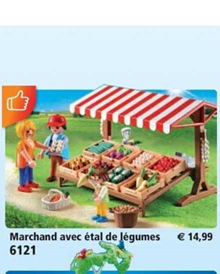 marchand avec étal de légumes