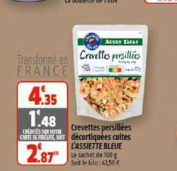 crevettes persillées décortiquées cuites l'assiette bleue