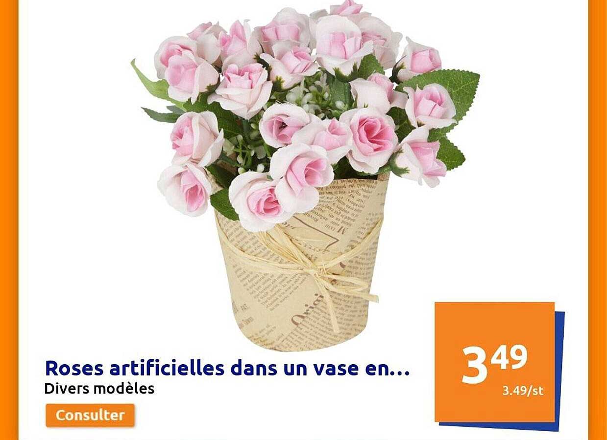 roses artificielles dans un vase en...